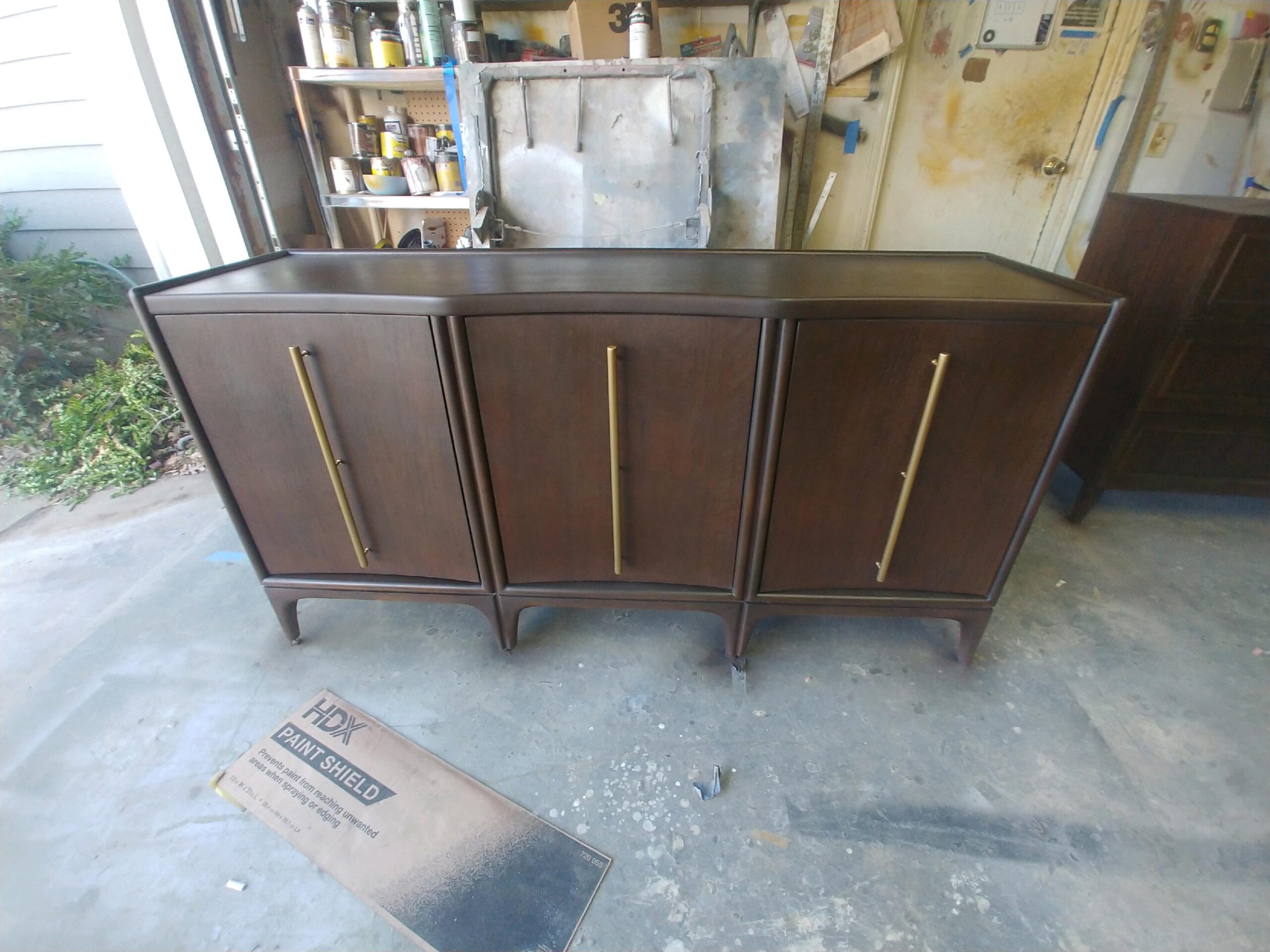 Mid-century credenza after refinishing in rich walnut