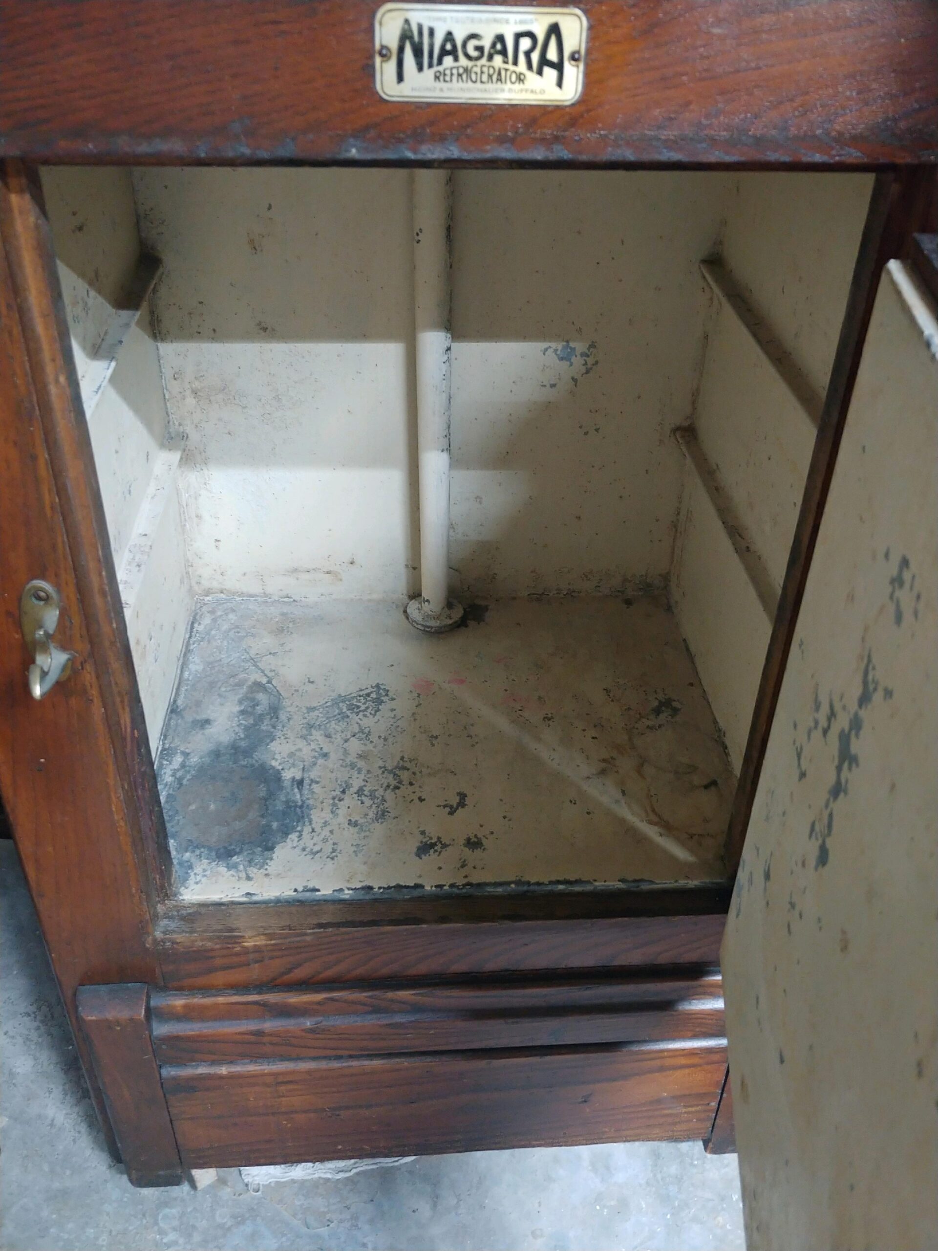 Antique Niagara icebox before restoration