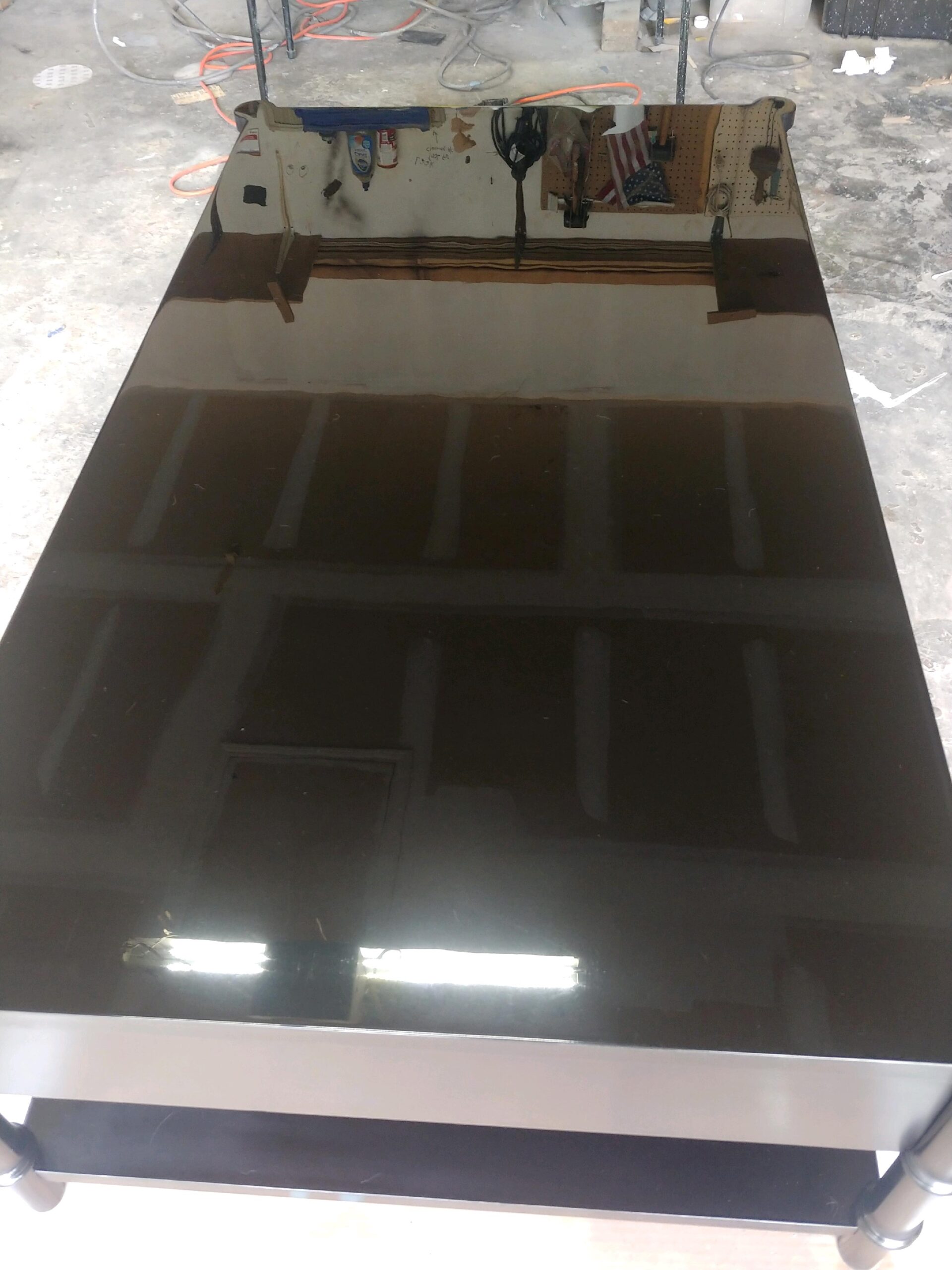 Glossy tabletop refinished detail
