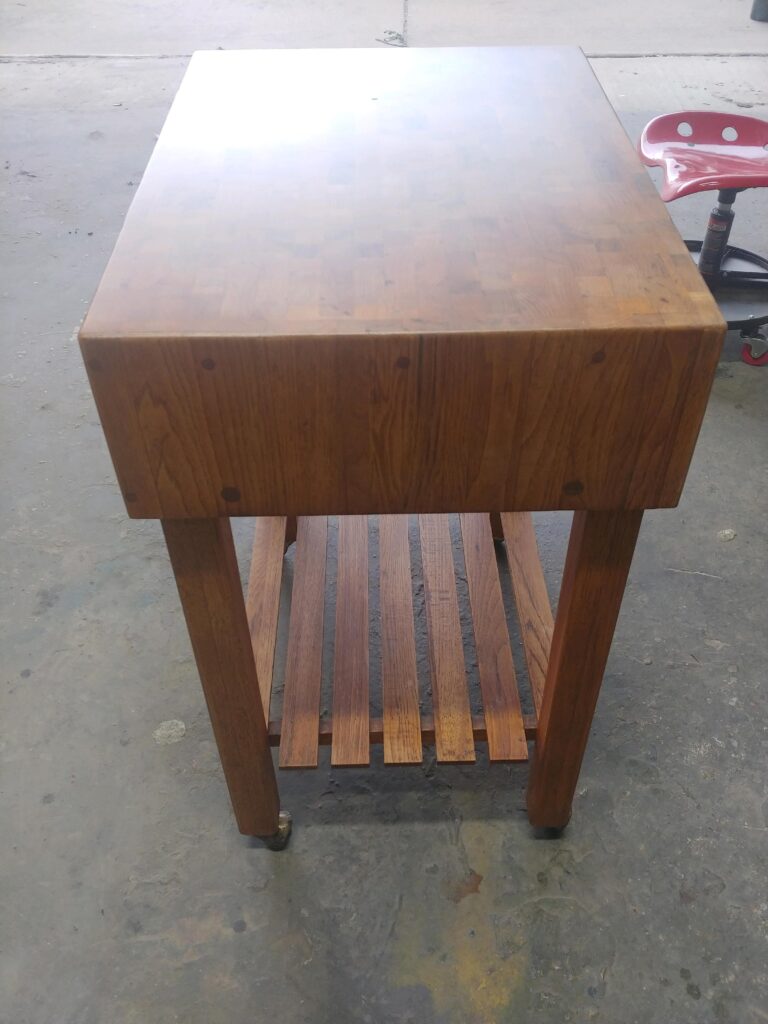 Refinished end-grain oak butcher block island restored in Dallas