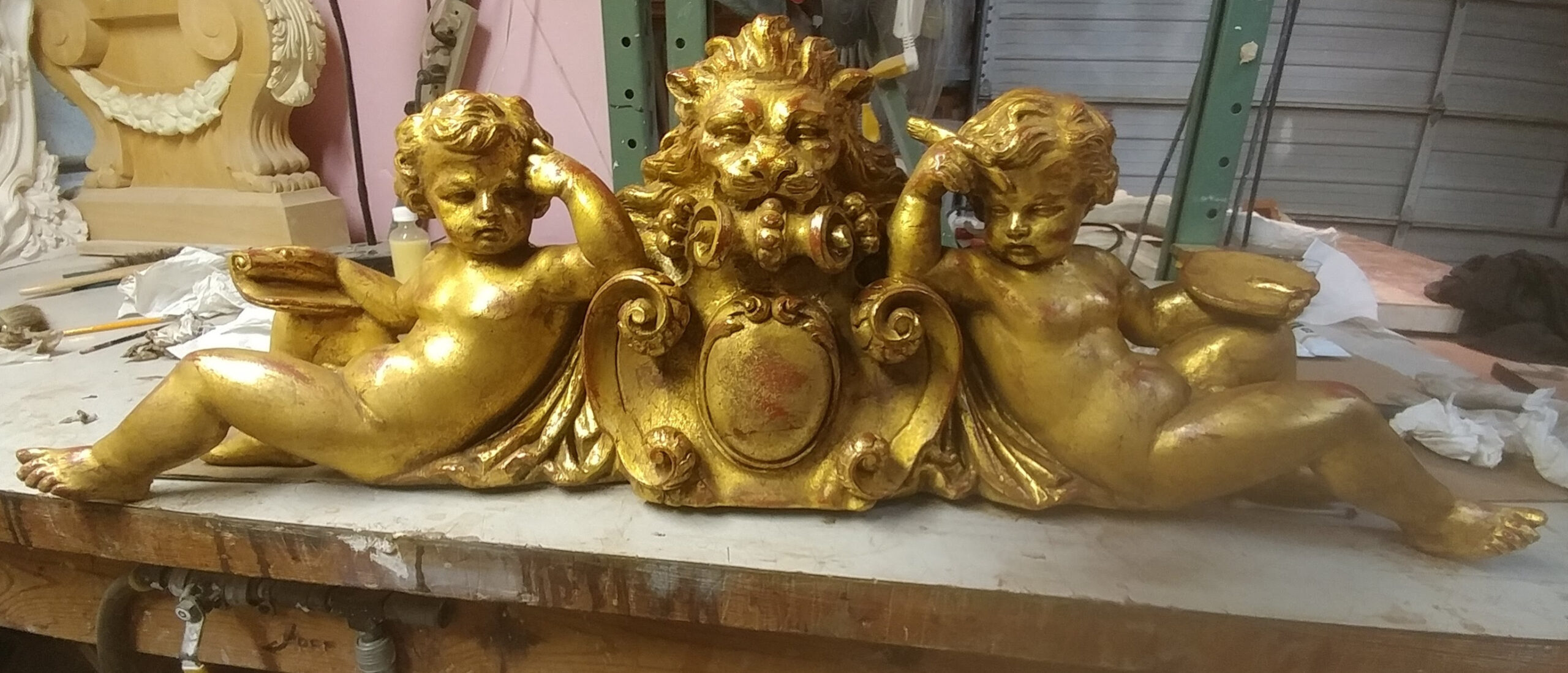 Furniture detail finished with gold leaf gilding