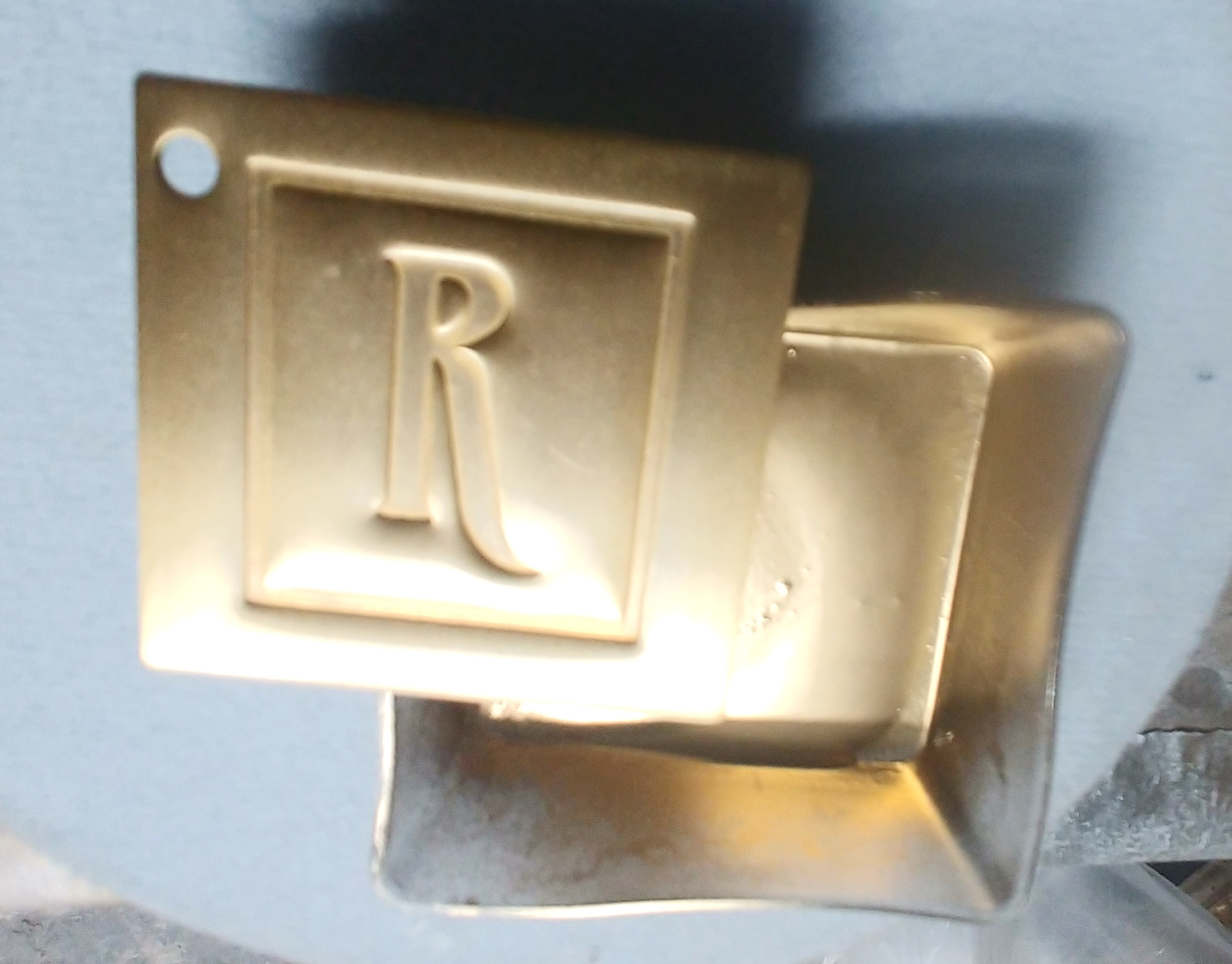 Client’s gold control sample beside the Roman gilding colour match